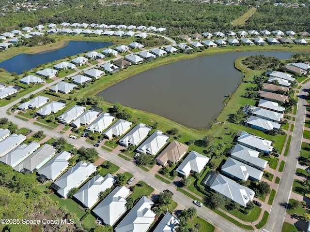 drone / aerial view featuring a water view