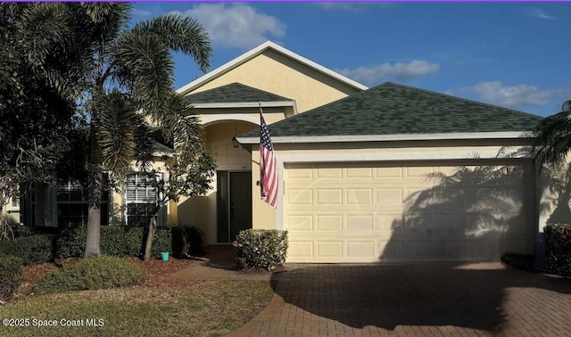 view of front of home with a garage