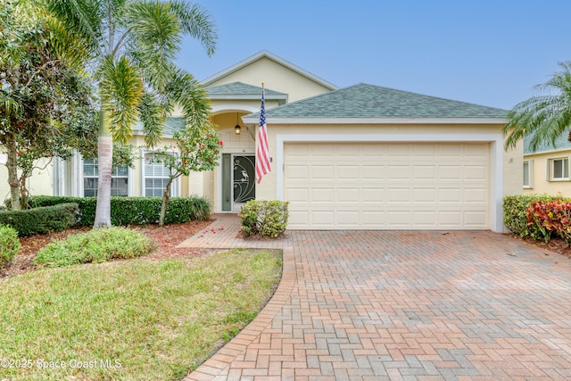 view of front of property featuring a garage