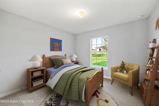 bedroom with light carpet