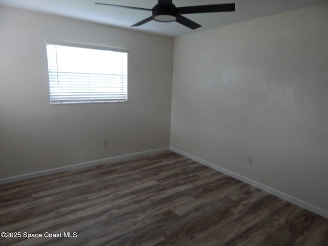 unfurnished room featuring dark hardwood / wood-style floors and ceiling fan