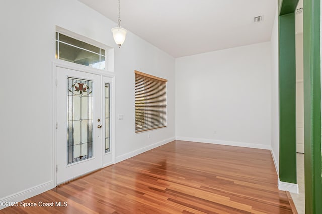 entrance foyer featuring hardwood / wood-style flooring