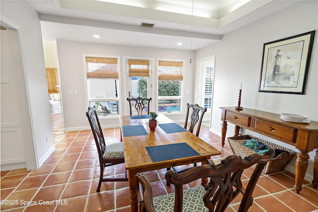 dining space with light tile patterned floors