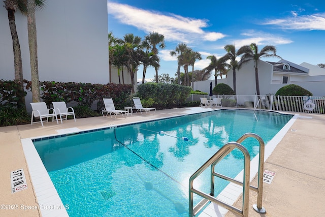 view of pool featuring a patio