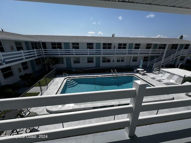 view of swimming pool with a patio