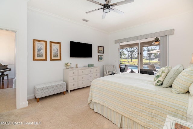 carpeted bedroom featuring crown molding, access to outside, and ceiling fan