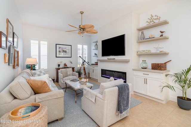 tiled living room with ceiling fan