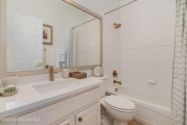 full bathroom with vanity, toilet, and shower / bath combo