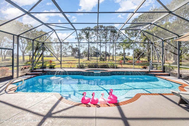 view of swimming pool featuring an in ground hot tub, a lanai, and a patio