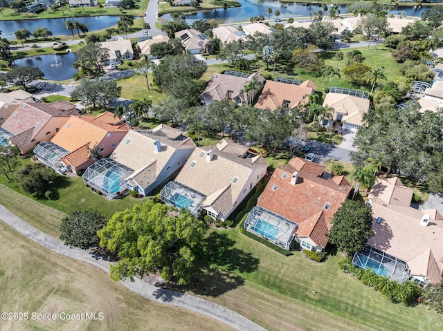 drone / aerial view featuring a water view