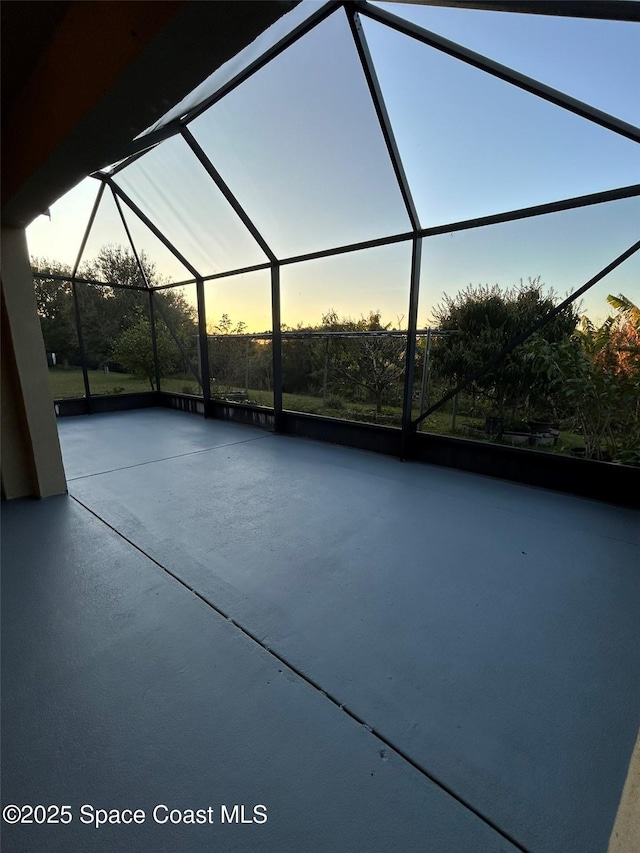 patio terrace at dusk with a lanai