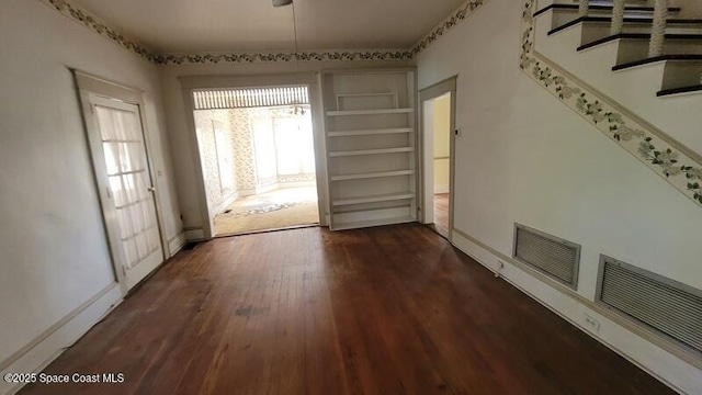 interior space with dark hardwood / wood-style flooring