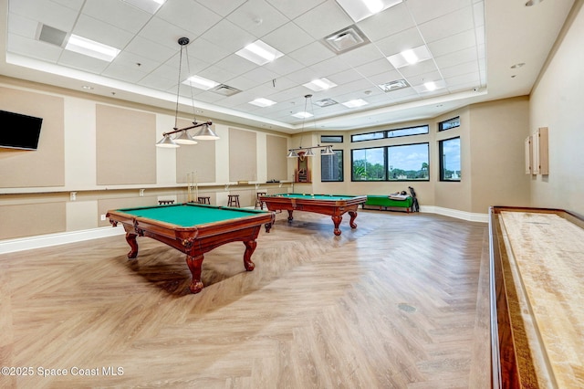 recreation room with parquet flooring, a drop ceiling, and billiards