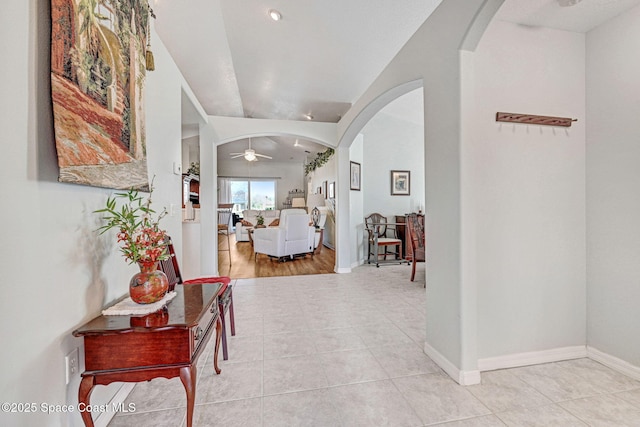 hallway featuring light tile patterned flooring