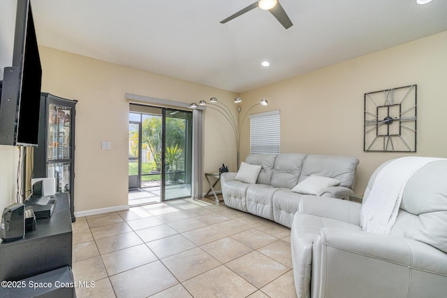 tiled living room with ceiling fan