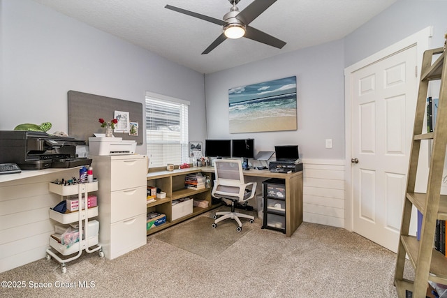 office area with ceiling fan