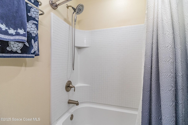 bathroom with shower / bathtub combination with curtain