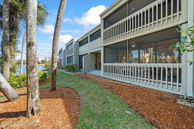 view of home's community with a water view