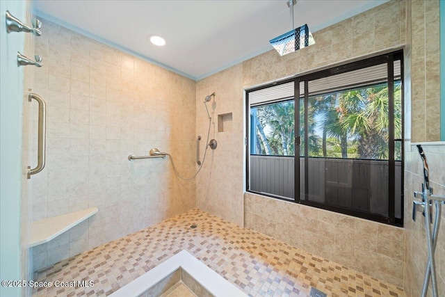 bathroom with tiled shower