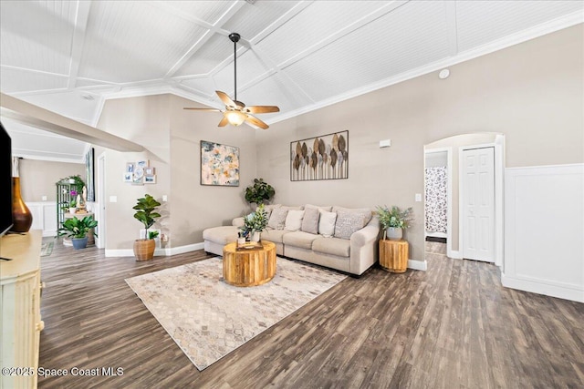 living room with ceiling fan, lofted ceiling, and dark hardwood / wood-style floors