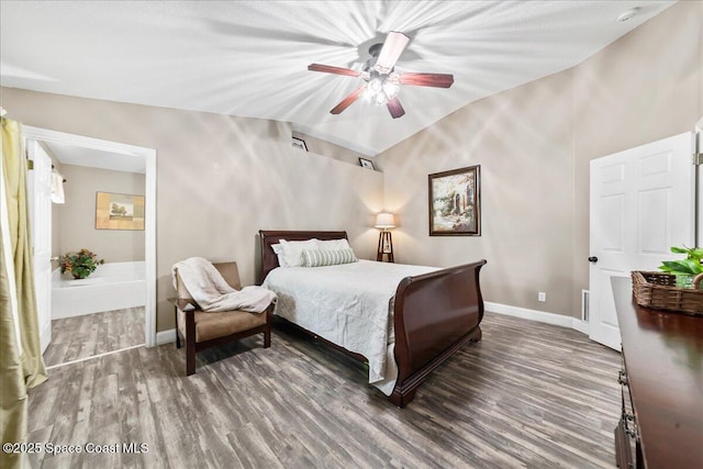 bedroom with ceiling fan, lofted ceiling, and dark hardwood / wood-style floors