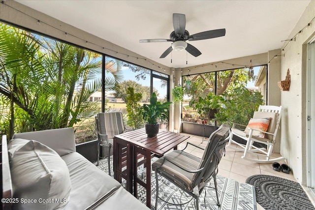 sunroom / solarium with ceiling fan