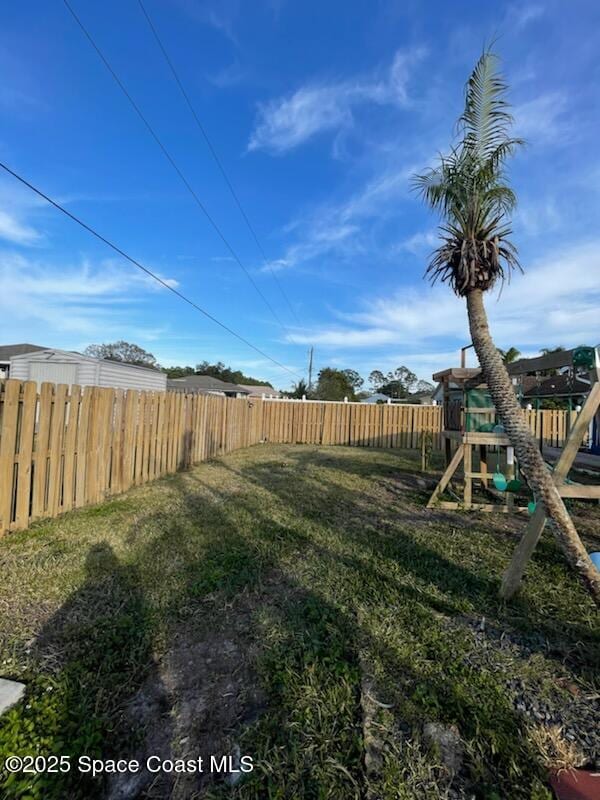 view of yard featuring a playground