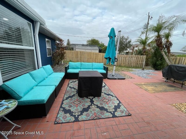 view of patio featuring area for grilling and outdoor lounge area