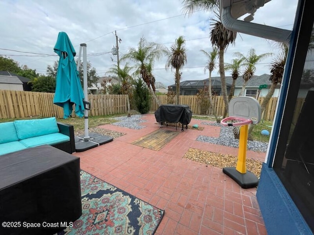 view of patio / terrace featuring area for grilling and outdoor lounge area