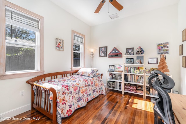 bedroom featuring dark wood-type flooring and ceiling fan