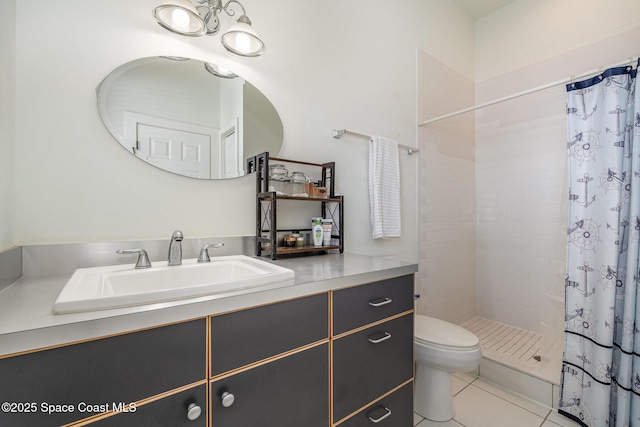 bathroom with vanity, tile patterned floors, toilet, and walk in shower