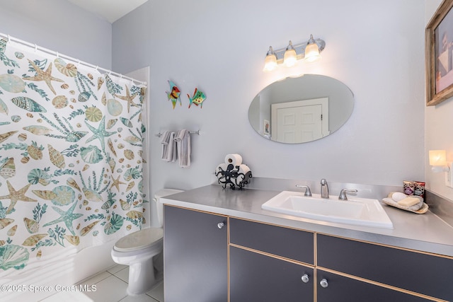 full bathroom featuring tile patterned flooring, vanity, shower / tub combo, and toilet