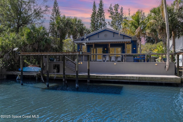 view of dock with a water view