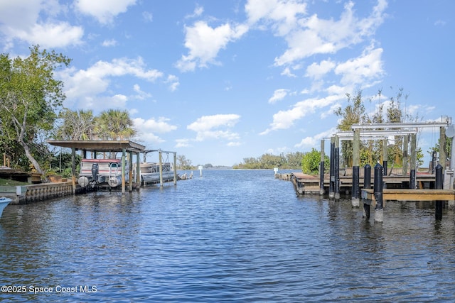 view of dock with a water view