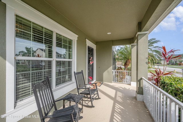 view of patio featuring a porch