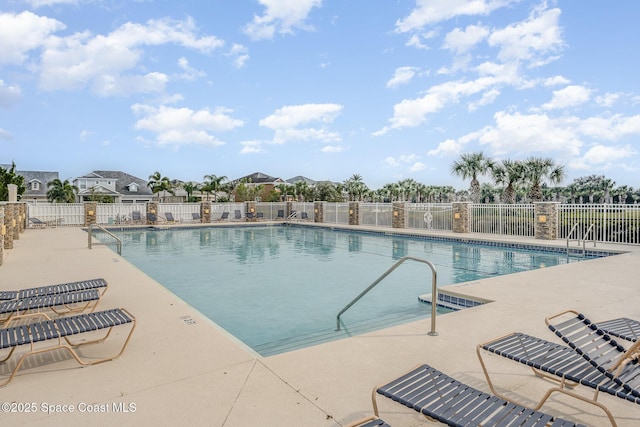 view of swimming pool featuring a patio