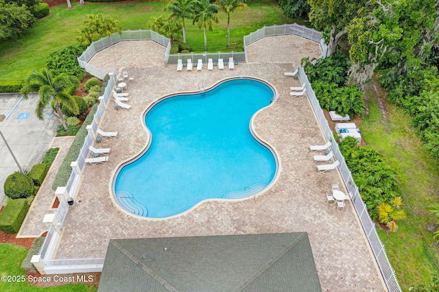 view of swimming pool featuring a patio area