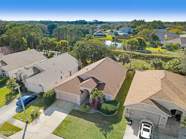 drone / aerial view featuring a water view