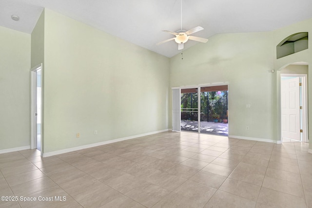 unfurnished room featuring high vaulted ceiling, ceiling fan, and light tile patterned flooring