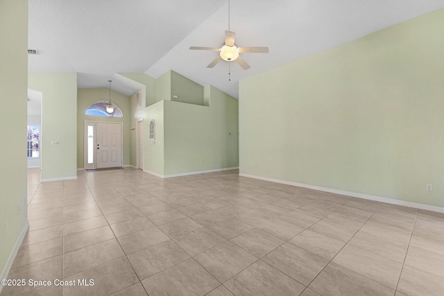 interior space with ceiling fan and high vaulted ceiling