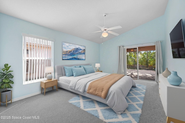 carpeted bedroom with ceiling fan, vaulted ceiling, and access to outside