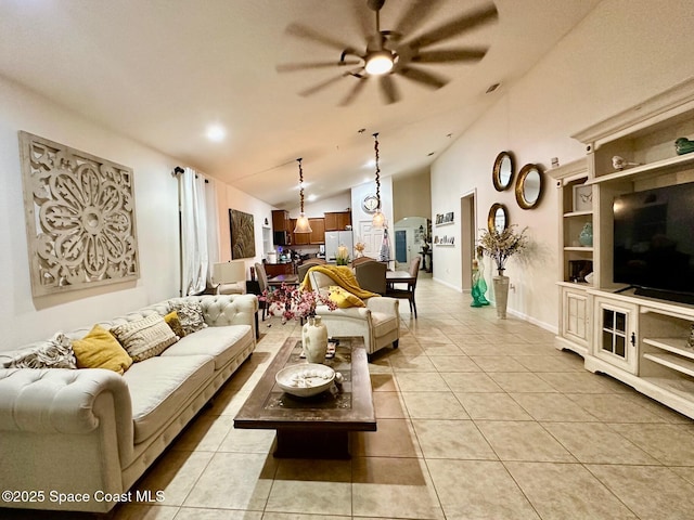 living room featuring light tile patterned flooring, vaulted ceiling, and ceiling fan