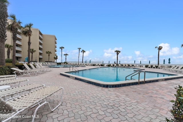 view of pool with a patio area