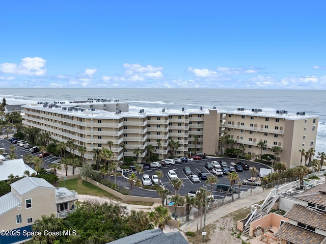 view of property with a water view