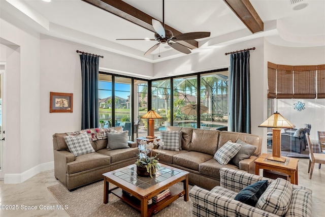 living room with beamed ceiling and ceiling fan