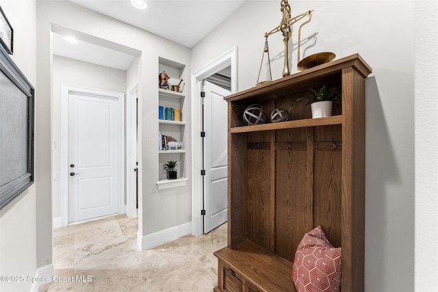 mudroom featuring built in features