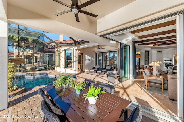 view of swimming pool featuring ceiling fan