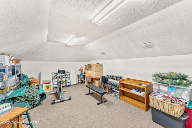 workout room with carpet flooring, vaulted ceiling, and a textured ceiling