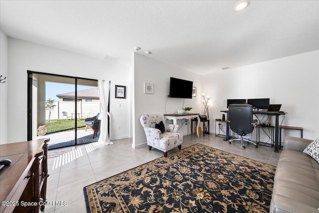 tiled living room with a textured ceiling