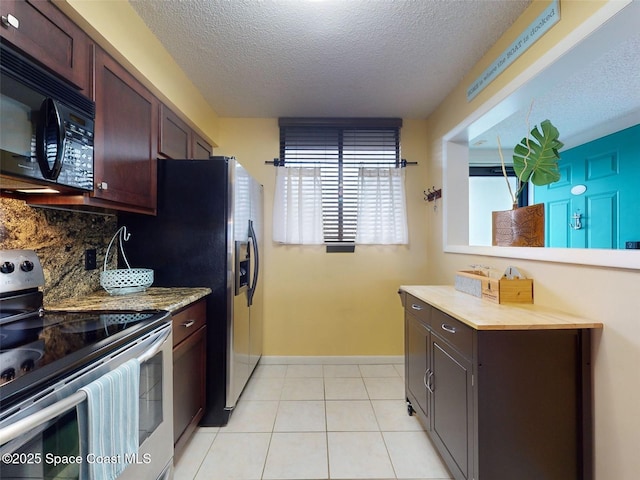 kitchen featuring decorative backsplash, dark brown cabinetry, stainless steel range with electric cooktop, and a textured ceiling